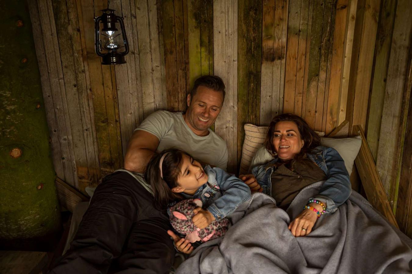 Happy family staying at Holmely shelter