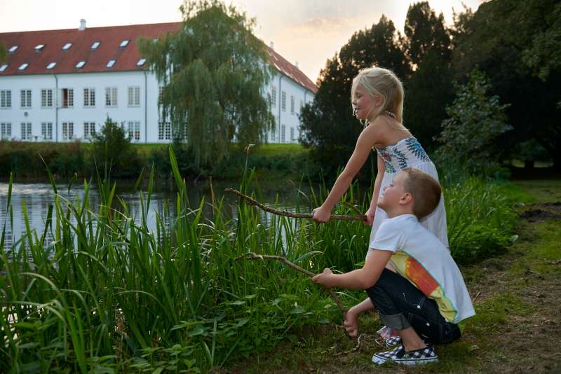Children playing by the lake in Bygholm Park