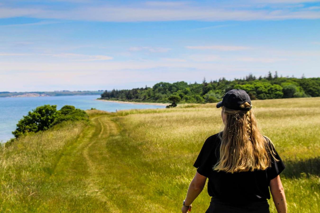 Woman walking at Nørreklint on Tunø