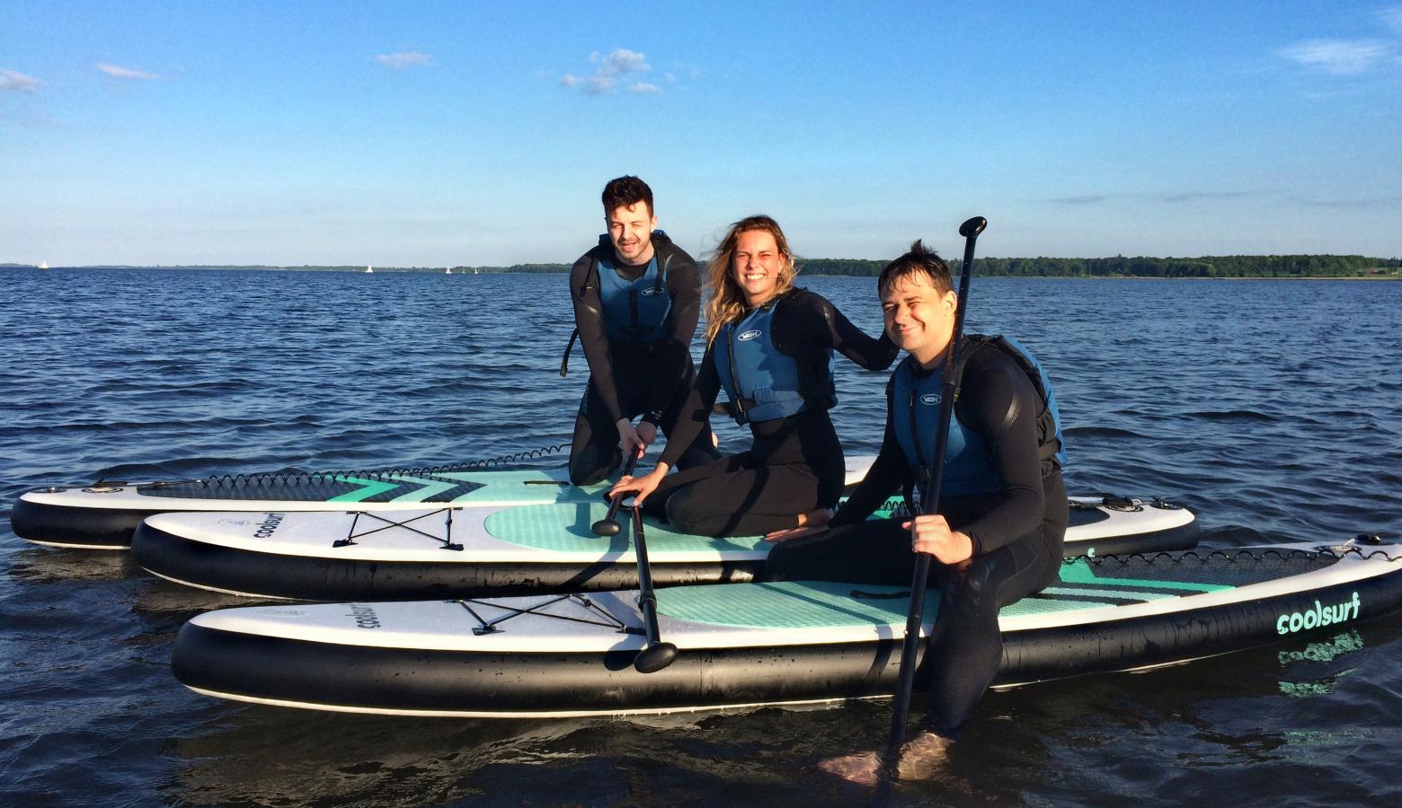 Three friends on SUP-boards in Horsens Fjord