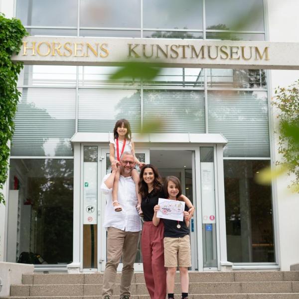 Family on a fun family activity called "The Horsens Rundt treasure hunt" at Horsens Art museum