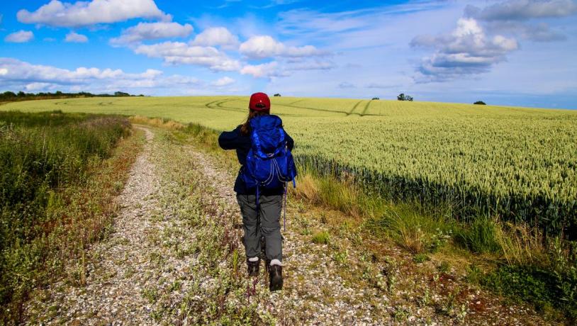 Backpacker walks on The Railway Path Odder-Horsens