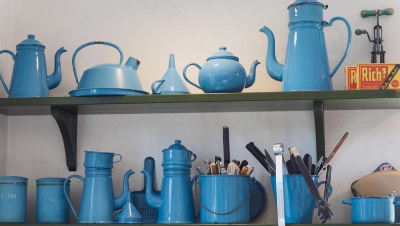 Shelfs with Madam Blå pots at Odder Museum