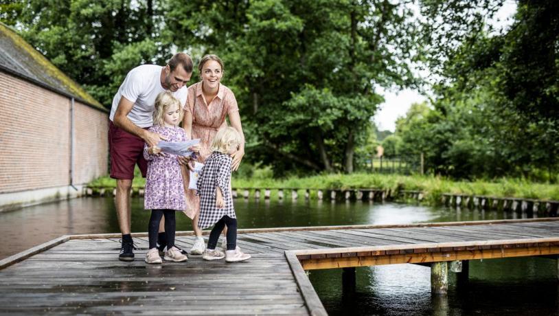Family of four treasure hunting in Odder, Denmark