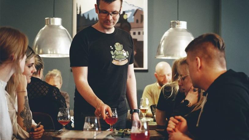 Friends enjoying themselves at the Board Game Café in Horsens