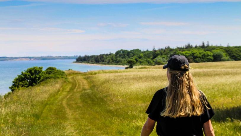 Woman walking at Nørreklint on Tunø