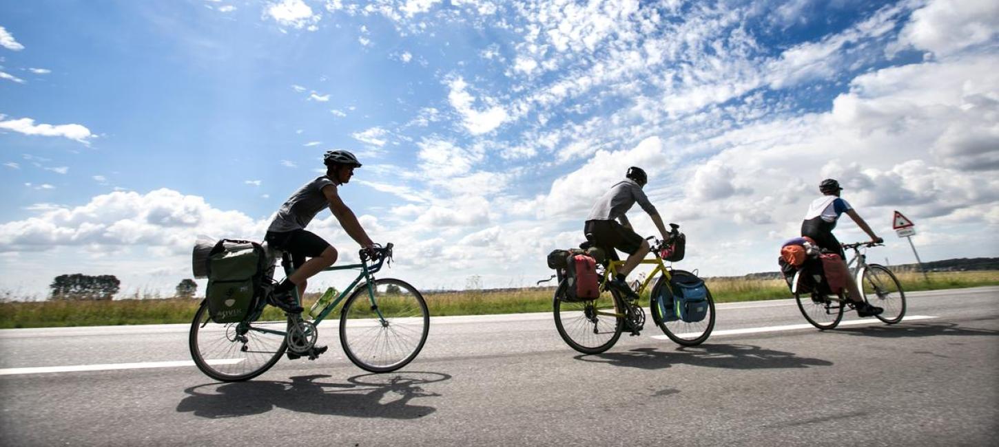 Three cyclist on on holiday in the Coastal Land while cycling