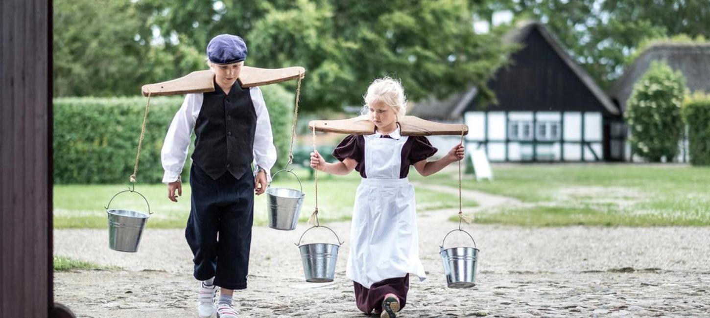 Kids dress up at the village history and open-air Glud museum in the costal land