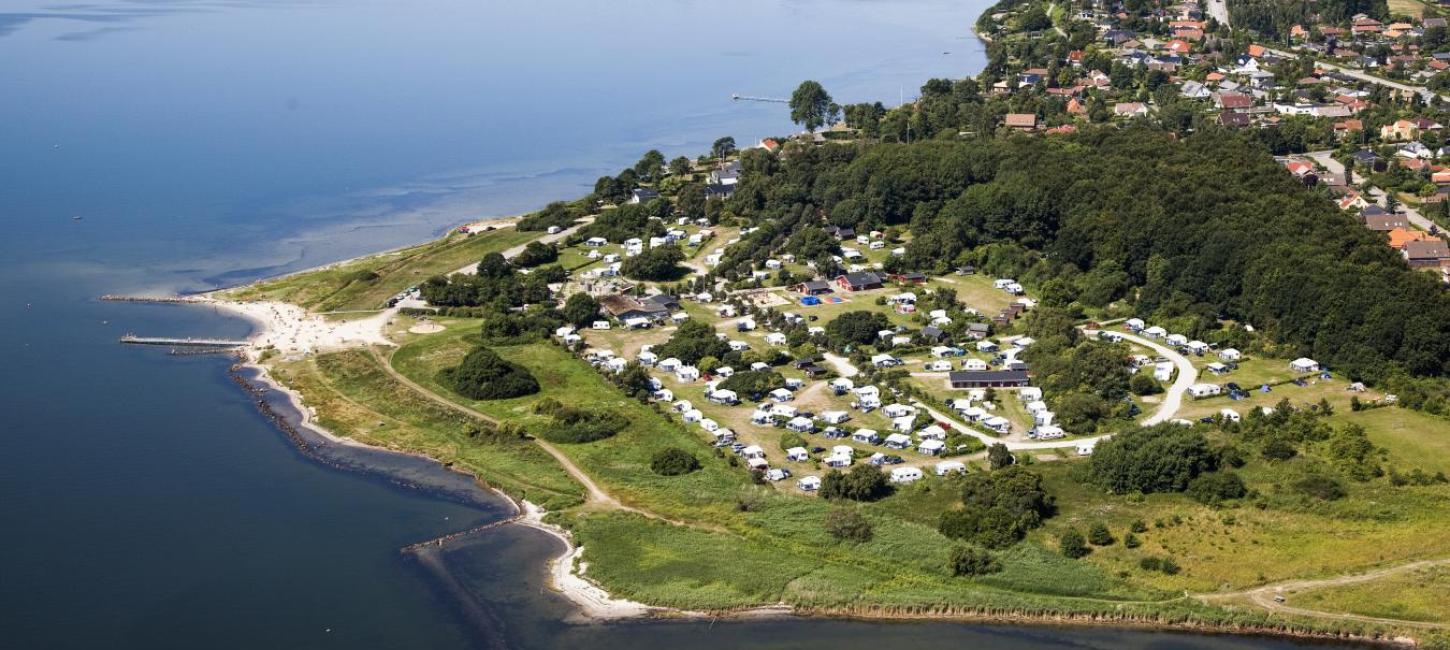 Aerial view of Husodde at Horsens Fjord with Husodde beach and Horsens City Camping