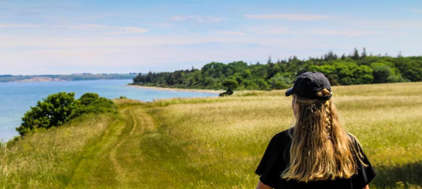 Woman walking at Nørreklint on Tunø