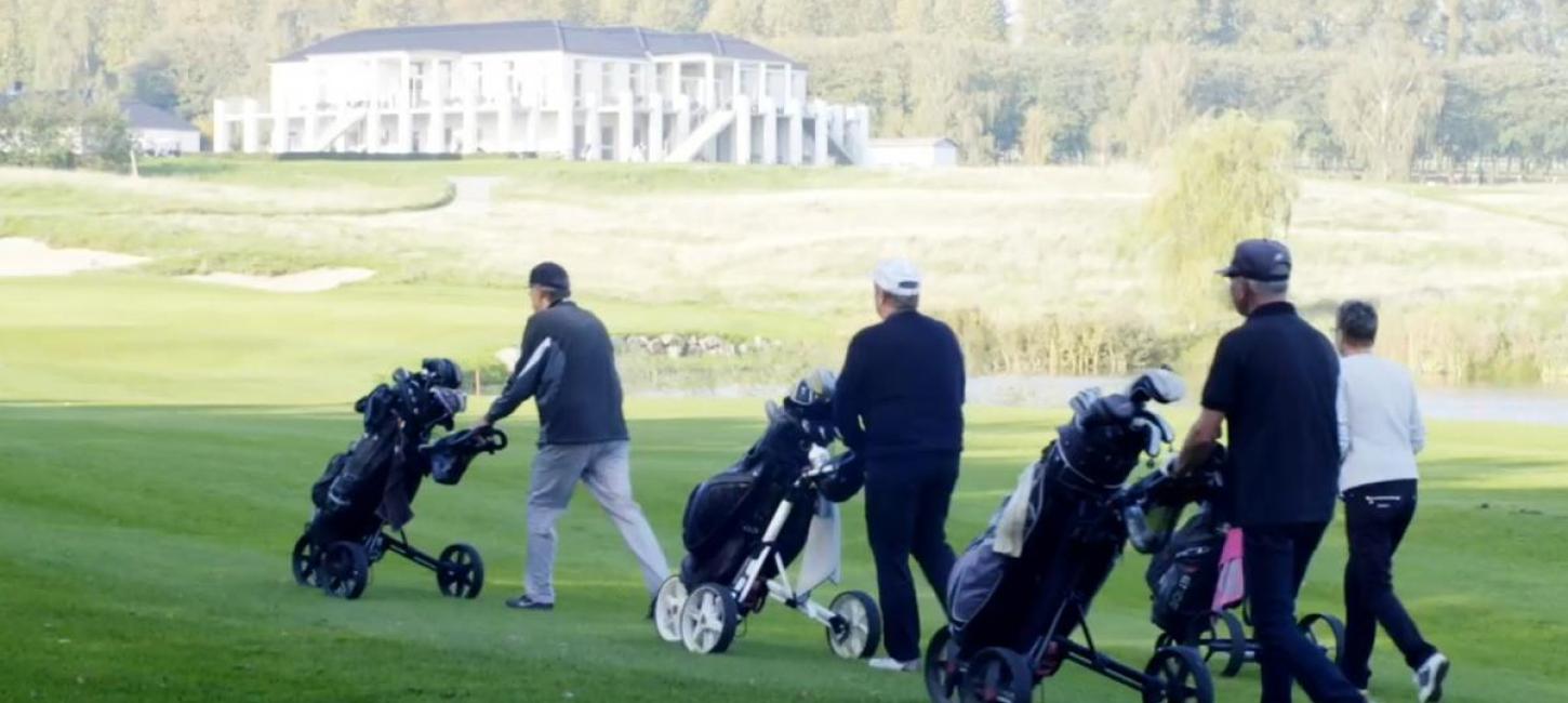 Four golf players on the course at Stensballe Golf Club
