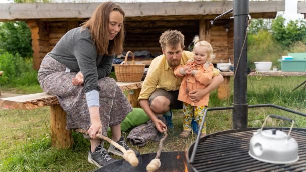 Family by a campfire in The Fairytale Forest near Odder