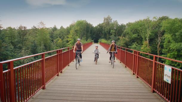 Cyclists on the Uncovered Bridge