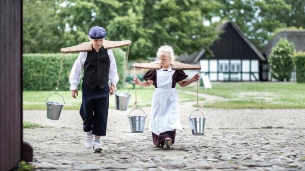 Kids dress up at the village history and open-air Glud museum in the costal land