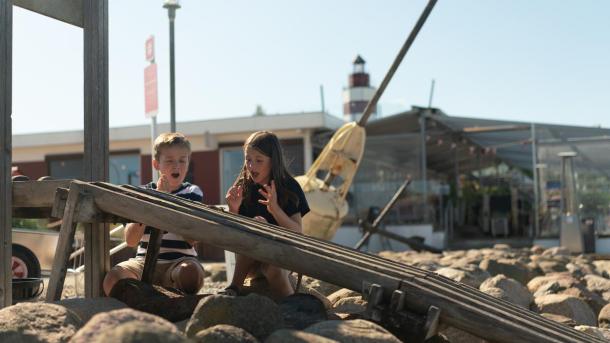 Children having crab races