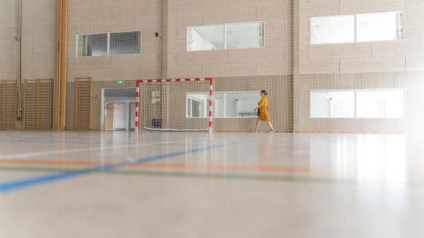 Woman walking in Juelsminde Halls - Activity Centre