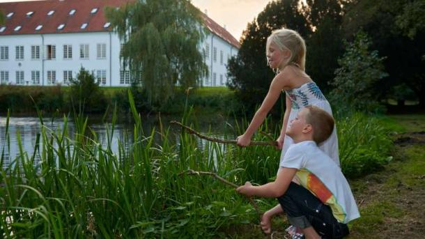 Children playing by the lake in Bygholm Park