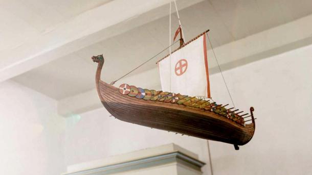 The Viking ship can be seen hanging from the ceiling in Denmark’s second smallest church on Hjarnø in the East Jutland Archipelago