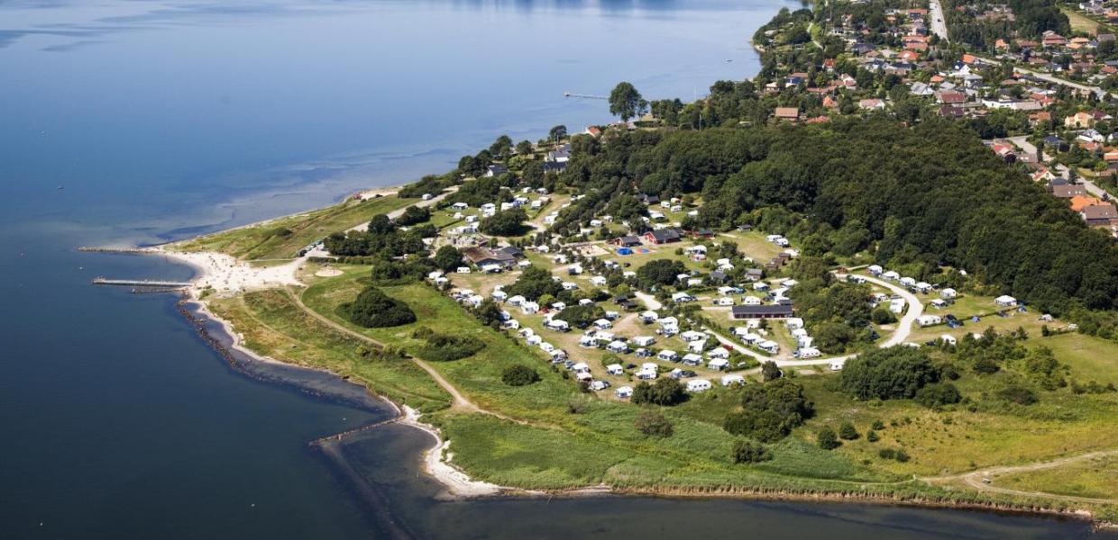 Aerial view of Husodde at Horsens Fjord with Husodde beach and Horsens City Camping