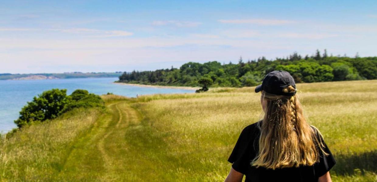 Woman walking at Nørreklint on Tunø