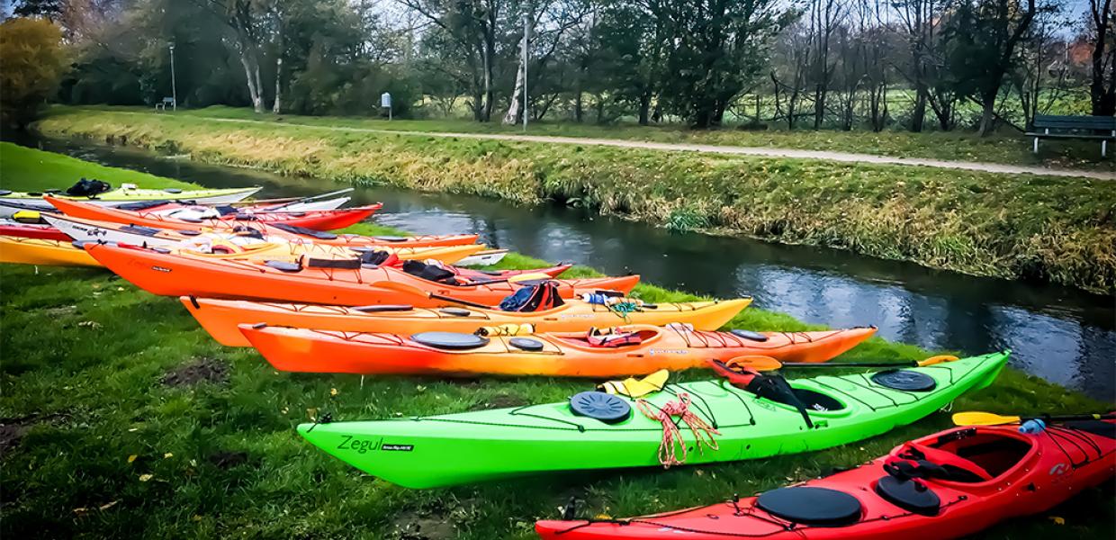 Kayaks at the bank of the Gudenå in Tørring