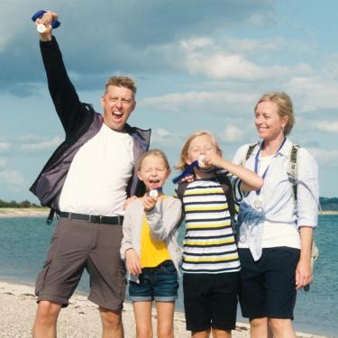 Family cheering after having completed the Tunoe Treasure Hunt