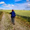 Backpacker walks on The Railway Path Odder-Horsens