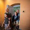 Family looks into a prison cell 