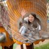 Girl in the play tower in Juelsminde Nature Play Park