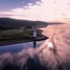 View of the coastal line and lighthouse in the area of Hotel Vejlefjord in the coastal land