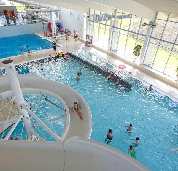 Children swimming in the various pools at Aqua Forum in Horsens - part of Destination Coastal Land