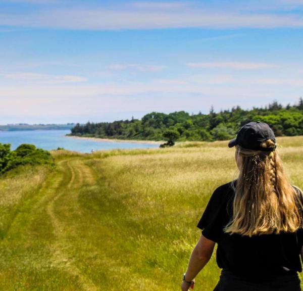 Woman walking at Nørreklint on Tunø