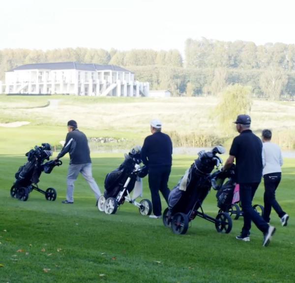 Four golf players on the course at Stensballe Golf Club