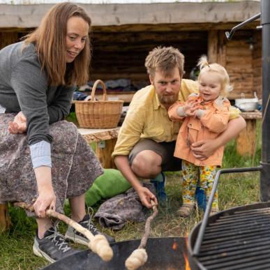 Family by a campfire in The Fairytale Forest near Odder