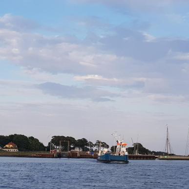 ferry on its way into Hjarnø Harbour