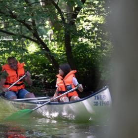 Father and daughter on a canoe trip.