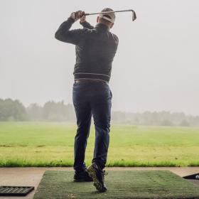 Golfer hits a golf ball at Horsens Golf Club