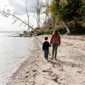 Children walking on Stenhøj Beach in the Coastal Land