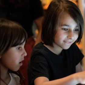 Two children playing with an interactive exhibition at the Industrial Museum in Horsens 