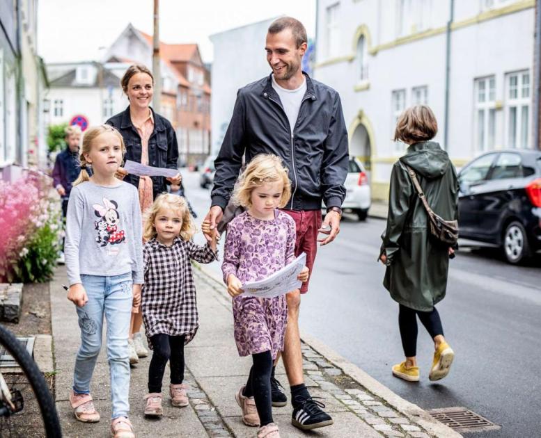 Family on a treasure hunt in the streets of Odder - part of Destination Coastal Land